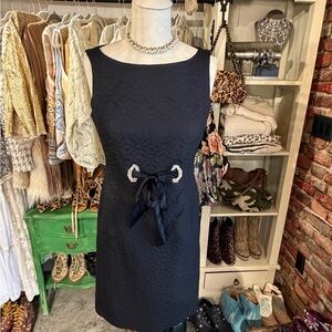 Taylor little black dress, think La Dolce Vita